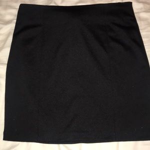 Stretchy black mini skirt ! Worn 2x.